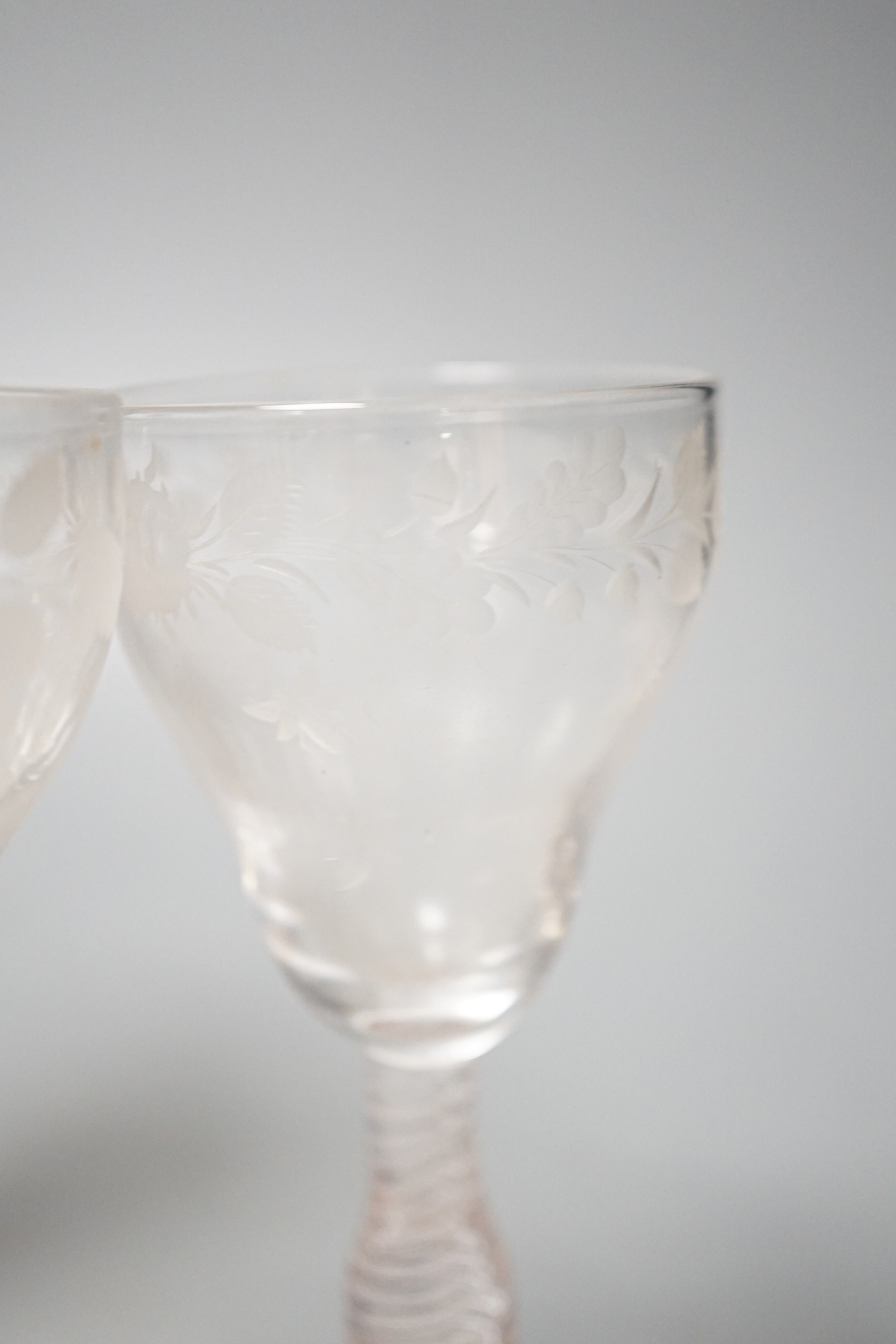 A pair of opaque twist cordial glasses with floral engraved bowls, 14cm and sundry glassware